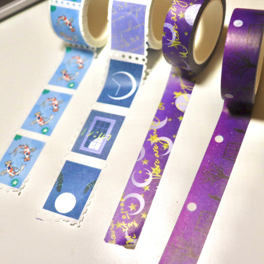 from left to right: Stamp Koi washi, 4 O'Clock Moon Stamp Washi, Purple Crescent Moon Washi, and Midnight Sky Washi